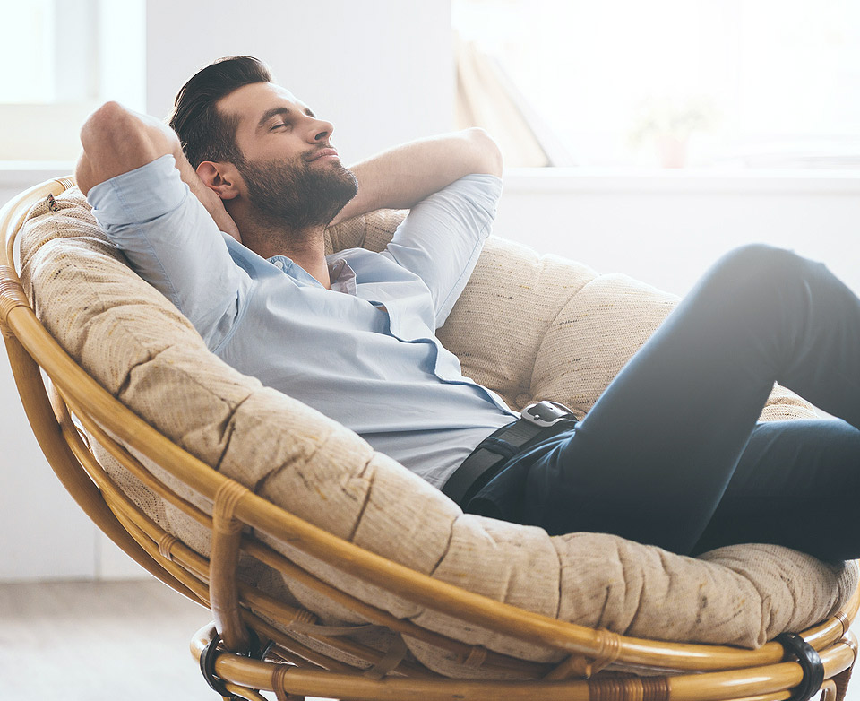 A man sitting on the sofa.